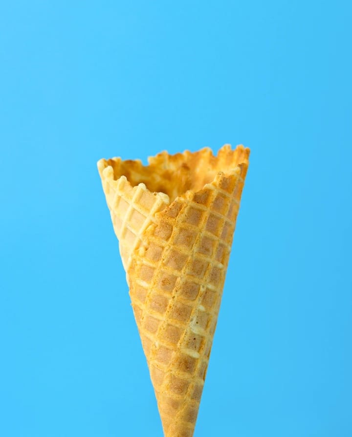 a cone on a blue background